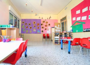 inside of the kindergarten classroom with drawings on the walls